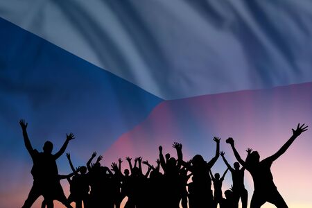 Peoples silhouette on flag and sky background, day of Czech Republic, independence holidayの写真素材