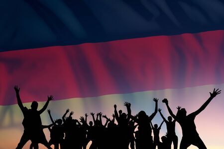 Peoples silhouette on flag and sky background, day of Germany, independence holidayの写真素材