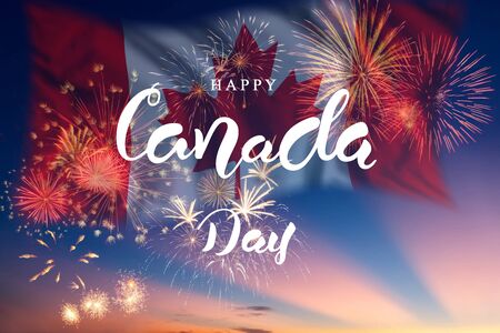Holiday sky with fireworks and flag of Canada and hand lettering text, independence dayの写真素材