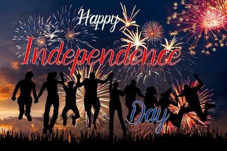 Holiday night sky with fireworks and flag of America and hand lettering text Happy Independence dayの写真素材