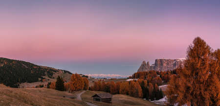 Landscape panorama with beautiful autumn mountain peaks and valley on dawnの写真素材