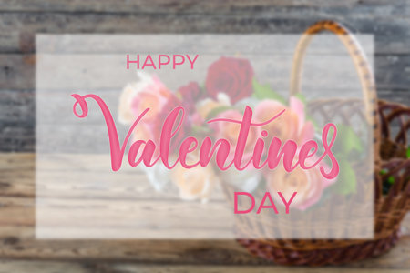 Valentine day holiday background with rose flowers and hand lettering textの写真素材