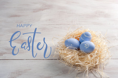 Easter colorful eggs on wooden backdrop, holiday background for your decoration. Egg hunt, "Happy Easter" textの写真素材