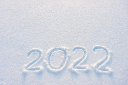 2022 holiday text draw on snow for New Year and Christmas card, place for your textの写真素材