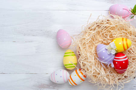 Easter colorful card wuth eggs and flowers, holiday background, place for your text. Egg huntの写真素材