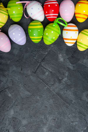 Easter colorful card with eggs and flowers, holiday background, place for your text. Egg huntの写真素材