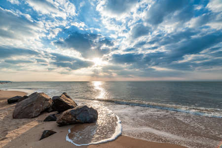 Beautiful summer landscape with sunrise over sea which can be seen on vacationの写真素材
