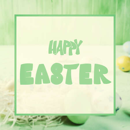 Happy easter painted eggs on wooden vintage table and lettering text. Vintage stylization, retro film filterの写真素材