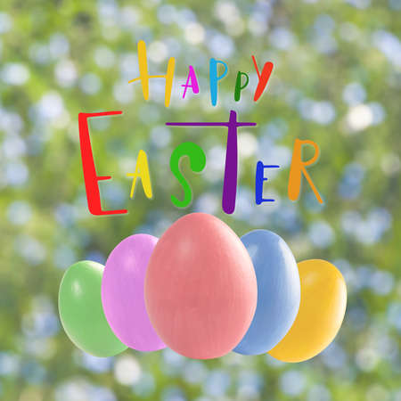 Holiday card with eggs in grass and hand lettering text Happy Easterの写真素材