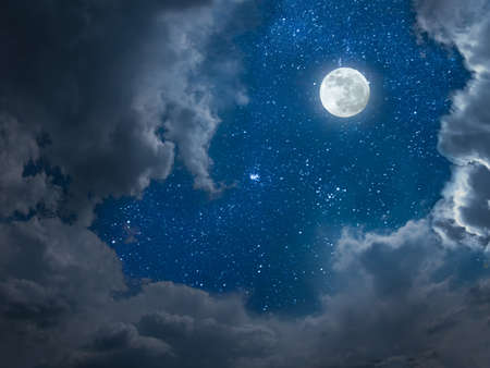 Night landscape with full moon and stars in skyの写真素材