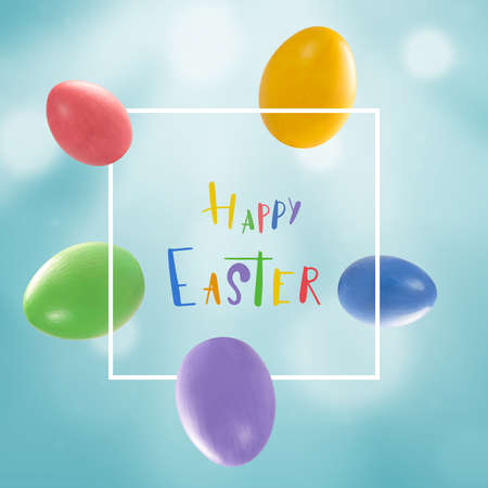 Holiday card with colorful eggs and Happy Easter lettering text in frameの写真素材