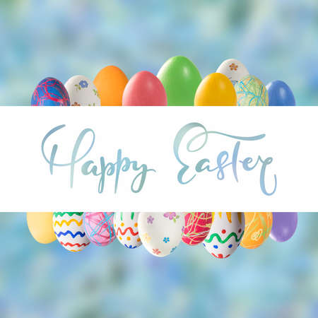 Holiday card with colorful painted eggs and Happy Easter lettering text on white frameの写真素材