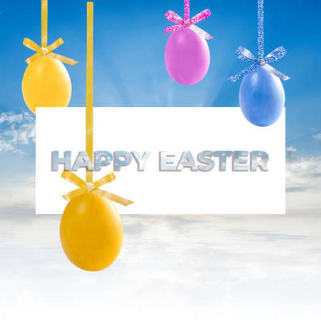 Holiday card with colorful easter eggs hang on ribbon and text on white frame