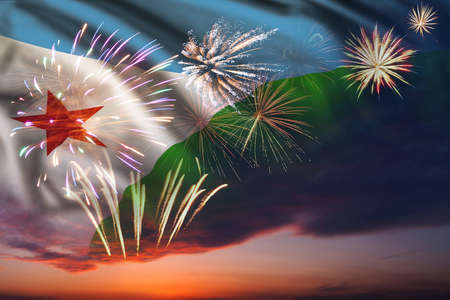 Majestic fireworks in evening skyHoliday night sky with fireworks and flag of Djibouti for Independence dayの写真素材