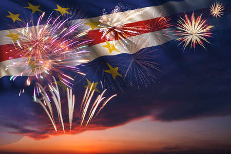 Holiday night sky with fireworks and flag of Cape Verde for Independence dayの写真素材