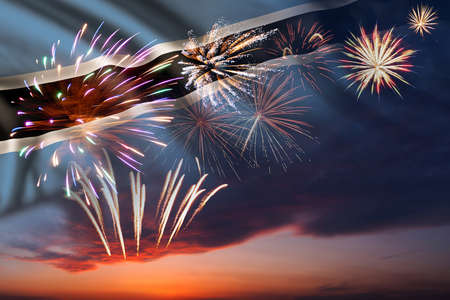 Holiday night sky with fireworks and flag of Botswana for Independence dayの写真素材