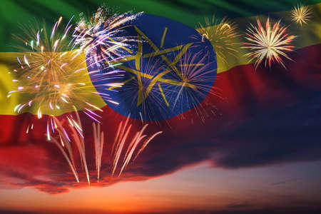 Majestic fireworks in evening skyHoliday night sky with fireworks and flag of Ethiopia for Independence dayの写真素材