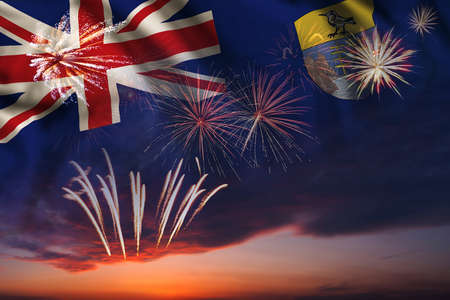 Holiday night sky with fireworks and flag of Saint Helena for Independence dayの写真素材