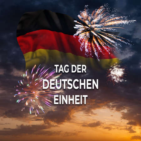 Germany Unity day holiday background with flag and fireworks. Text on German - Day of German unity