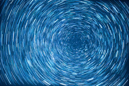 Stars trail long exposure of night skyの写真素材