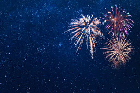 Holiday background for Christmas or Independence day with fireworks. For your designの写真素材