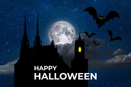 Mystic dark castle against background of full moon on Halloween nightの写真素材