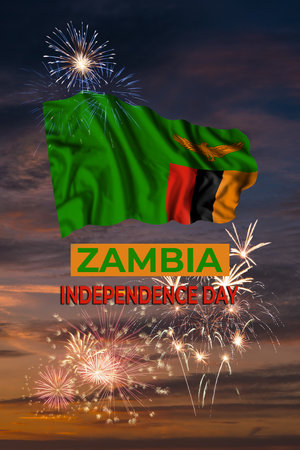 Holiday sky with fireworks and flag of Zambia of Independence dayの写真素材
