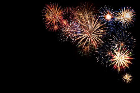 Holiday background for Christmas or Independence day with fireworks. For your designの写真素材