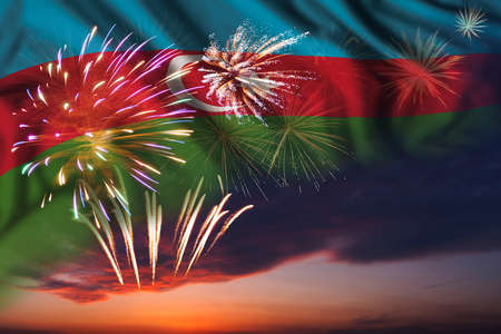 Majestic fireworks in evening sky Holiday night sky with fireworks and flag of Azerbaijan for Independence dayの写真素材