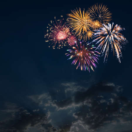 Holiday background with fireworks in sky for Christmas or Independence day. Your creative designの写真素材
