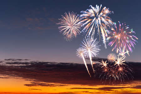 Holiday background for Christmas or Independence day with fireworks. For your designの写真素材