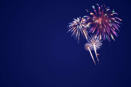 Holiday New Year 2022 greetings card with fireworks and textの写真素材