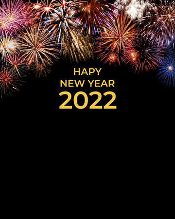 Holiday New Year 2022 greetings card with fireworks and textの写真素材