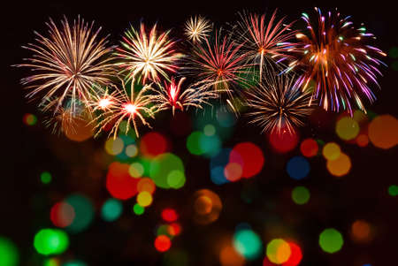 Holiday background for Christmas or Independence day with fireworks. For your designの写真素材