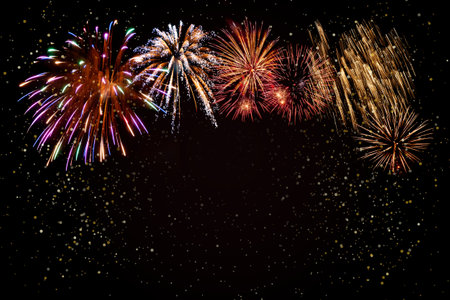 Holiday background for Christmas or Independence day with fireworks. For your designの写真素材