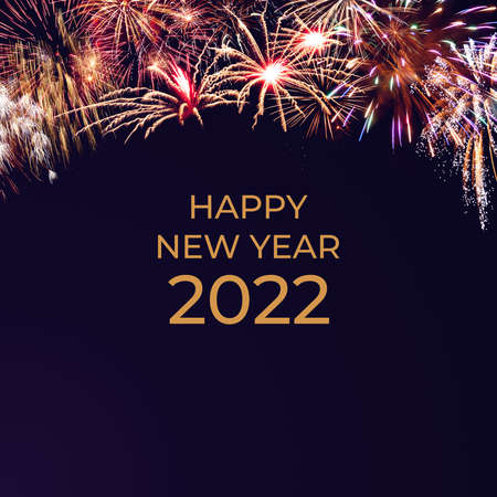 Holiday New Year 2022 greetings card with fireworks and textの写真素材