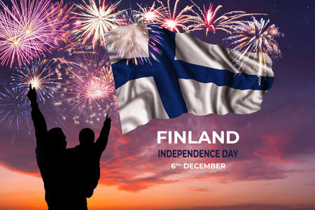 Holiday sky with fireworks and flag of Finland on Independence dayの写真素材