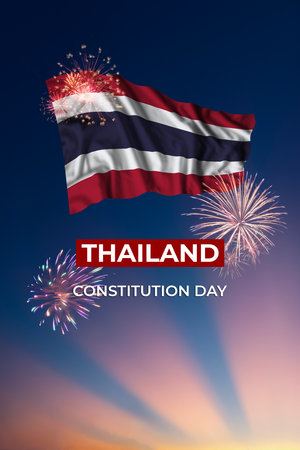 Holiday sky with fireworks and flag of Thailand on Constitution dayの写真素材