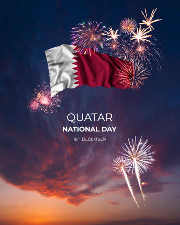Holiday sky with fireworks and flag of Quatar on Independence dayの写真素材