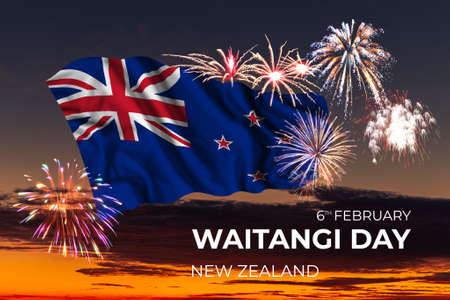 Evening sky with majestic fireworks and flag of New Zealand on National holidayの写真素材