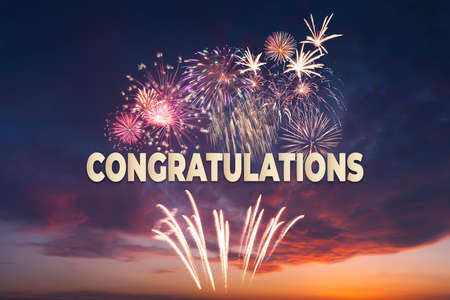 Congratulations greetings banner with fireworks in the sky for your celebratingの写真素材