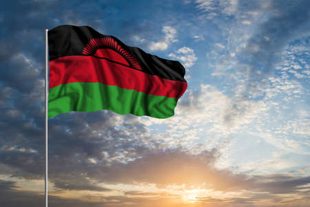 Waving National flag of Malawi in beautiful skyの写真素材