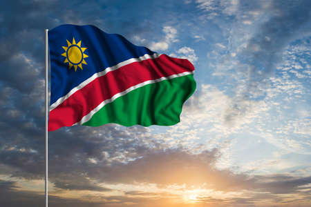 Waving National flag of Namibia in beautiful skyの写真素材