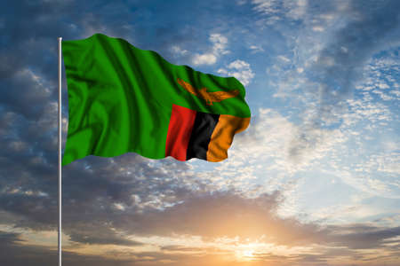 Waving National flag of Zambia in beautiful skyの写真素材