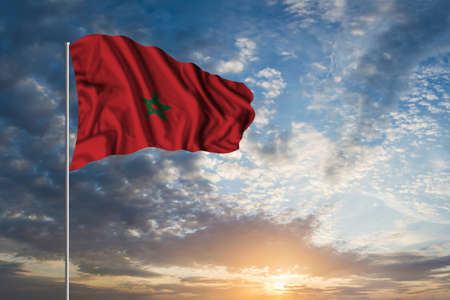 Waving National flag of Morocco in beautiful skyの写真素材