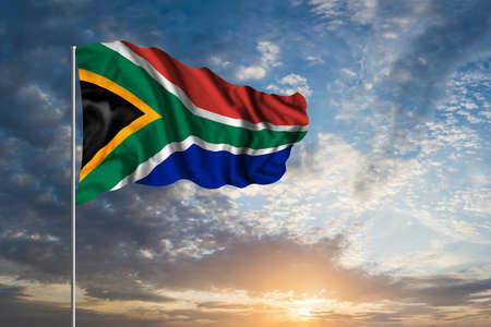 Waving National flag of South Africa in beautiful skyの写真素材