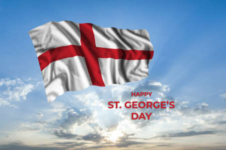 England St Georges day card with flag in sunny blue sky. national holidayの写真素材