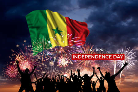 Evening sky with majestic fireworks and flag of Senegal on National holidayの写真素材