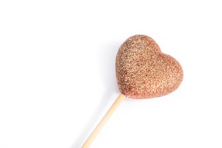 Golden Heart Cake Topper isolated on whiteの写真素材