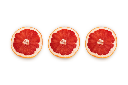 Sliced half of pink grapefruit isolated on white background. Top viewの写真素材